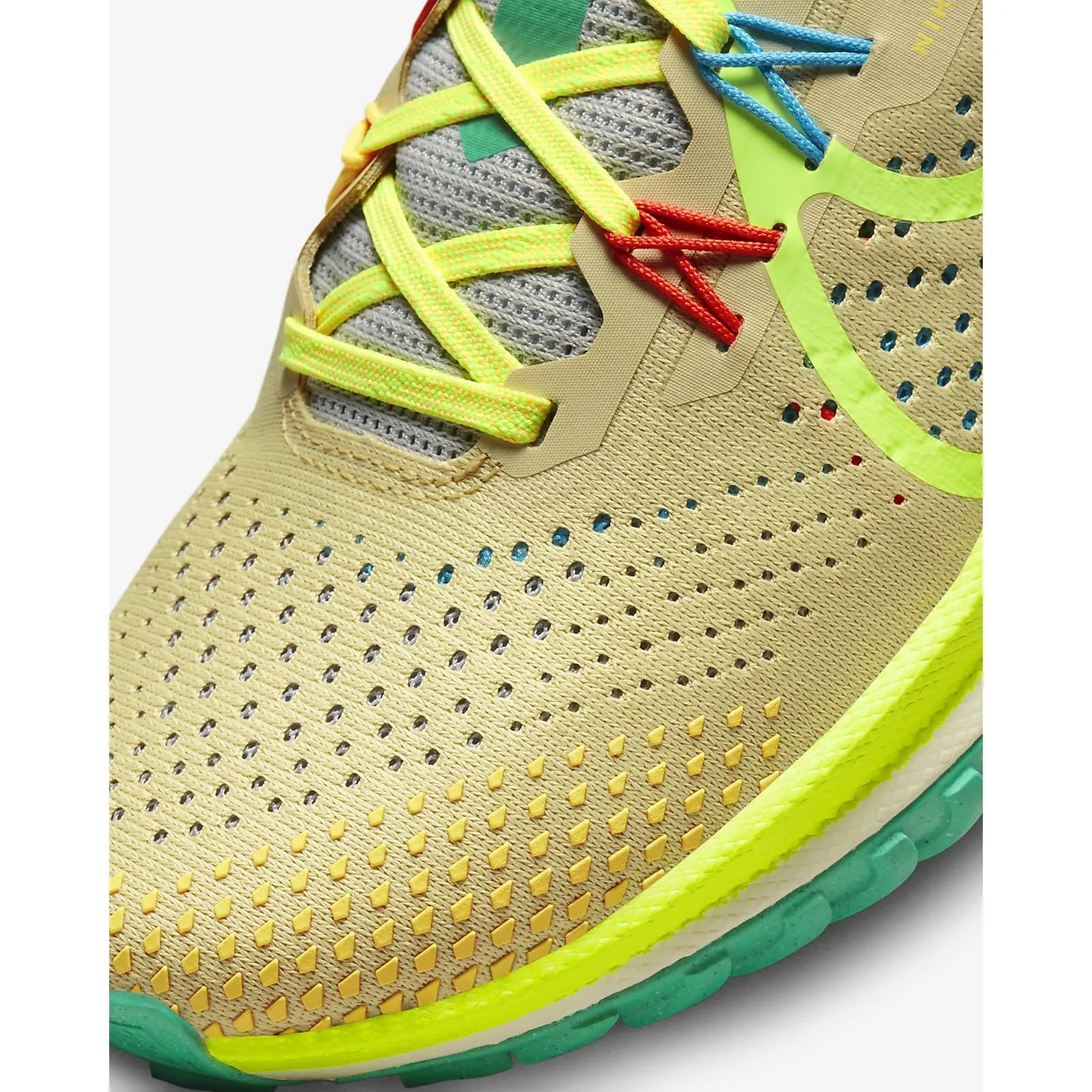 Nike Women's React Pegasus Trail 4 (Team Gold/Baltic Blue/Stadium Green/Volt) Slip Resistant Pattern