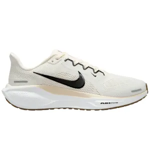 Women's Nike Pegasus 41 running in a lava field area shoes adult running wear